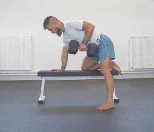 Dumbbell exercise on a bench