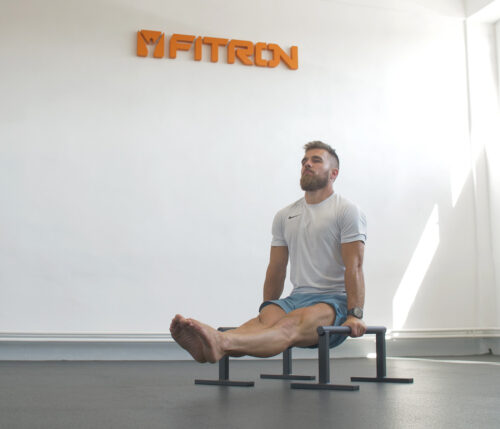 Exercise L-sit on bars